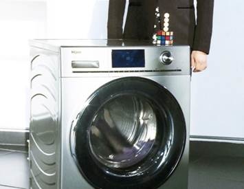 :海尔洗衣机上立硬币引发的思考_新闻_电脑之